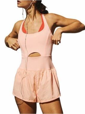 Free people righteous runsie in pastel peach NWT